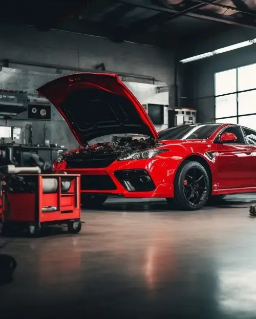 Professional car repair workshop with vehicle diagnostics and automotive electronic parts by Auto24Parts
